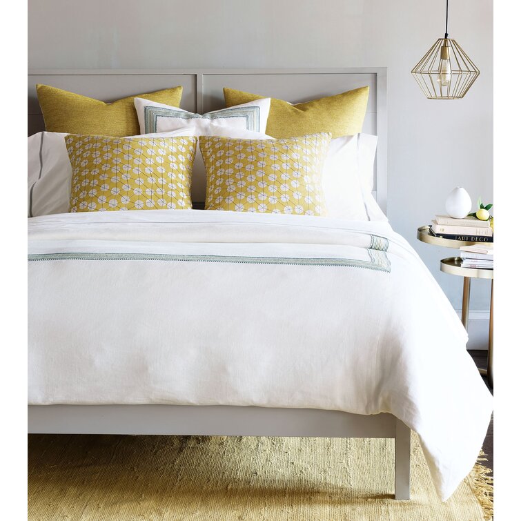 White bedding 2024 with accent pillows